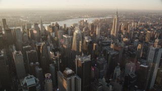 4K aerial stock footage Flying by Midtown Manhattan, Empire State Building, New York, sunrise Aerial Stock Footage | AX90_047