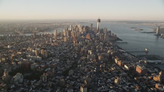 4K aerial stock footage Approaching Lower Manhattan, New York, New York, sunrise Aerial Stock Footage | AX90_064