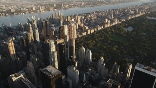 4K aerial stock footage Flying by Midtown Manhattan skyscraper, New York, New York, sunrise Aerial Stock Footage | AX90_077