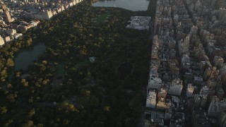 4K aerial stock footage Flying over Central Park, Metropolitan Museum of Art, New York, sunrise Aerial Stock Footage | AX90_080