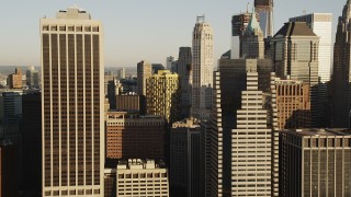 4K aerial stock footage Flying by Lower Manhattan skyscrapers, New York, New York, sunrise Aerial Stock Footage | AX90_105