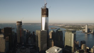 4K aerial stock footage of Freedom Tower, One World Trade Center, Lower Manhattan, New York, sunrise Aerial Stock Footage | AX90_121