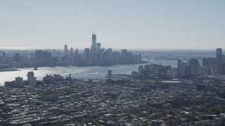 4K aerial stock footage of the Lower Manhattan skyline and Hudson River, New York seen from Union City, New Jersey Aerial Stock Footage | AX91_002