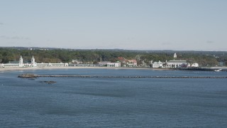 AX91_048 - 4K aerial stock footage of flying by Playland amusement park and beach, Rye, New York