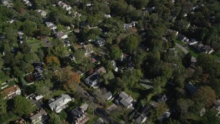 AX91_069 - 4K aerial stock footage of flying over suburban neighborhoods, Greenwich, Connecticut