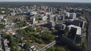 AX91_074 - 4K aerial stock footage of approaching office buildings in Downtown Stamford, Connecticut