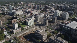 AX91_075 - 4K aerial stock footage of flying over office buildings in Downtown Stamford, Connecticut