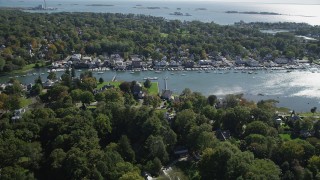 4K aerial stock footage of approaching waterfront property on Five Mile River, Norwalk, Connecticut Aerial Stock Footage | AX91_090