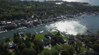 4K aerial stock footage of flying by waterfront property on Five Mile River, Norwalk, Connecticut Aerial Stock Footage | AX91_091