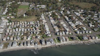 4K aerial stock footage of passing beachfront homes in Milford, Connecticut Aerial Stock Footage | AX91_128