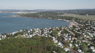 4K aerial stock footage of flying by beachfront homes on Morris Cove, New Haven, Connecticut Aerial Stock Footage | AX91_132