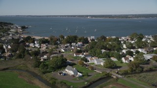 4K aerial stock footage of flying by homes and Morris Cove, New Haven, Connecticut Aerial Stock Footage | AX91_135