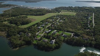 4K aerial stock footage of approaching upscale, waterfront homes in Southold, New York Aerial Stock Footage | AX91_195