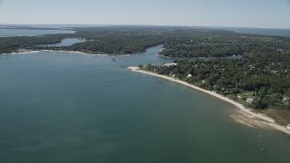 4K aerial stock footage of flying by coastal neighborhoods, Southold, New York Aerial Stock Footage | AX91_199