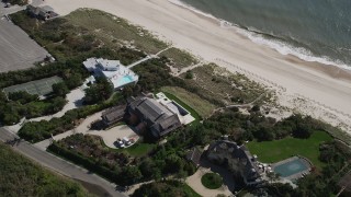 4K aerial stock footage of flying over beachfront mansions in Southampton, New York Aerial Stock Footage | AX91_216