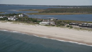 4K aerial stock footage of flying by a beachfront mansion in Southampton, New York Aerial Stock Footage | AX91_218