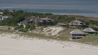 4K aerial stock footage of passing by upscale beach homes, Southampton, New York Aerial Stock Footage | AX91_222