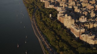 4K aerial stock footage Flying by Henry Hudson Parkway, Upper West Side, New York, New York, sunset Aerial Stock Footage | AX93_014