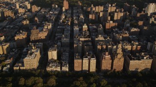 4K aerial stock footage Flying by apartment buildings, Upper West Side, New York, New York, sunset Aerial Stock Footage | AX93_016