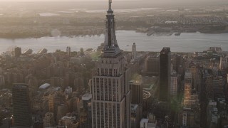 4K aerial stock footage Flying by Empire State Building, Midtown Manhattan, New York, sunset Aerial Stock Footage | AX93_036