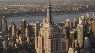 4K aerial stock footage Flying by Empire State Building, Midtown Manhattan, New York, sunset Aerial Stock Footage | AX93_039