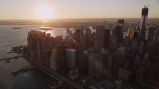 4K aerial stock footage Approaching Lower Manhattan, tilt down, New York, New York, sunset Aerial Stock Footage | AX93_068