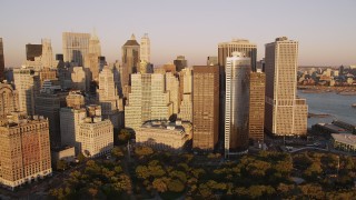 4K aerial stock footage Flying by skyscrapers near Battery Park, Lower Manhattan, New York, sunset Aerial Stock Footage | AX93_076