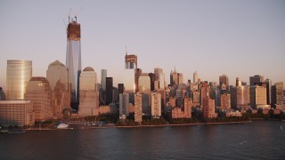 4K aerial stock footage One World Trade Center, Lower Manhattan, Hudson River, New York, sunset Aerial Stock Footage | AX93_102