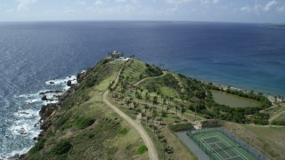 5k stock footage aerial stock footage approach and orbit gold-domed building on Little St James Island, St Thomas, Virgin Islands Aerial Stock Footage | AX96_160