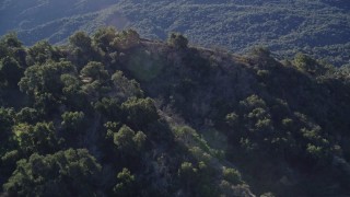 5K aerial stock footage of approaching hills on the shore and flying over, Lake Casitas, California Aerial Stock Footage | AXSF01_018