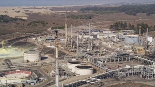 AXSF02_014 - 5K aerial stock footage of approaching Phillips 66 Company Santa Maria Refinery, Arroyo Grande, California