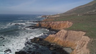 AXSF02_055 - 5K aerial stock footage fly over coastal cliffs near Diablo Canyon Power Plant, Avila Beach, California