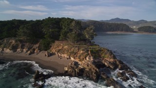 5K aerial stock footage of rounding the coastline, revealing San Simeon Bay, San Simeon, California Aerial Stock Footage | AXSF03_042