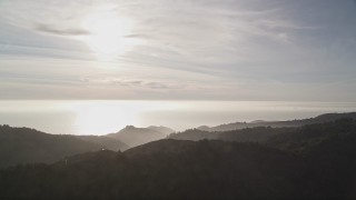 5K aerial stock footage of a view of the Pacific Ocean, seen from the hills, Big Sur, California Aerial Stock Footage | AXSF03_104