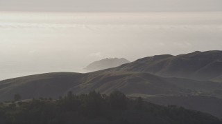 AXSF03_110 - 5K aerial stock footage of flying by Point Sur State Historic Park, Monterey County, California