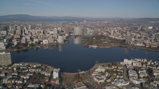 5K aerial stock footage tilt from an urban neighborhood, reveal and approach Lake Merritt, Downtown Oakland, California Aerial Stock Footage | AXSF05_002