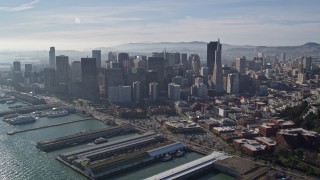 5K aerial stock footage of reverse view of skyscrapers, reveal North Beach and Coit Tower, Downtown San Francisco, California Aerial Stock Footage | AXSF05_018