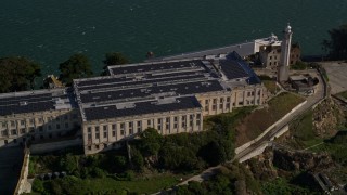 AXSF05_024 - 5K aerial stock footage orbit main building and lighthouse on Alcatraz in San Francisco, California