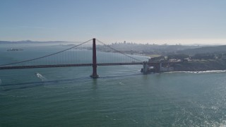 5K aerial stock footage Flying by Golden Gate Bridge, downtown skyline in the background, San Francisco, California Aerial Stock Footage | AXSF05_031