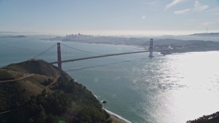 5K aerial stock footage fly over Marin Hills to reveal Golden Gate Bridge, an iconic landmark, San Francisco, California Aerial Stock Footage | AXSF05_042