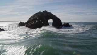 5K aerial stock footage tilt from the Pacific Ocean revealing Seal Rocks, San Francisco, California Aerial Stock Footage | AXSF05_050