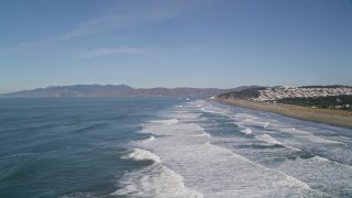 5K aerial stock footage waves crashing near Ocean Beach, Outer Sunset District, California Aerial Stock Footage | AXSF05_054