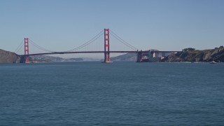 5K aerial stock footage of tilting from water to reveal the famous Golden Gate Bridge, San Francisco, California Aerial Stock Footage | AXSF05_059