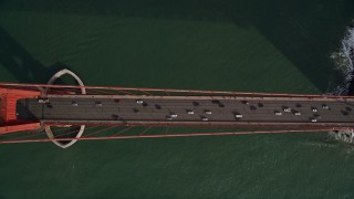 5K aerial stock footage of a bird's eye view of traffic on the famous Golden Gate Bridge, San Francisco, California Aerial Stock Footage | AXSF06_043