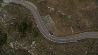 5K aerial stock footage track silver convertible on Highway 1, Marin County, California Aerial Stock Footage | AXSF06_055