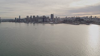 5K aerial stock footage pan from skyscrapers to reveal Bay Bridge, Downtown San Francisco, California Aerial Stock Footage | AXSF06_085