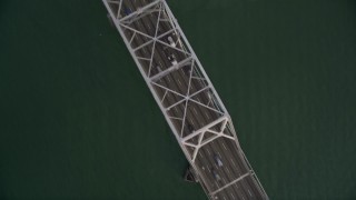 5K aerial stock footage of a bird's eye view of the upper deck of Bay Bridge, San Francisco, California Aerial Stock Footage | AXSF06_088