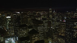 5K aerial stock footage tilt from The Embarcadero, reveal and fly over skyscrapers, Downtown San Francisco, California, night Aerial Stock Footage | AXSF07_016