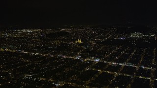 5K aerial stock footage approach St. Ignatius Church, Inner Richmond District, San Francisco, California, night Aerial Stock Footage | AXSF07_048