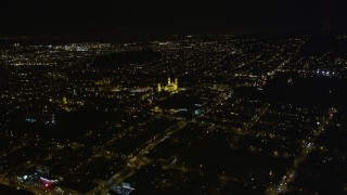 5K aerial stock footage tilt to reveal St. Ignatius Church, Inner Richmond District, San Francisco, California, night Aerial Stock Footage | AXSF07_049